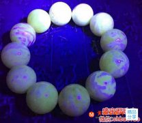 白花蜜蠟手串紫光圖